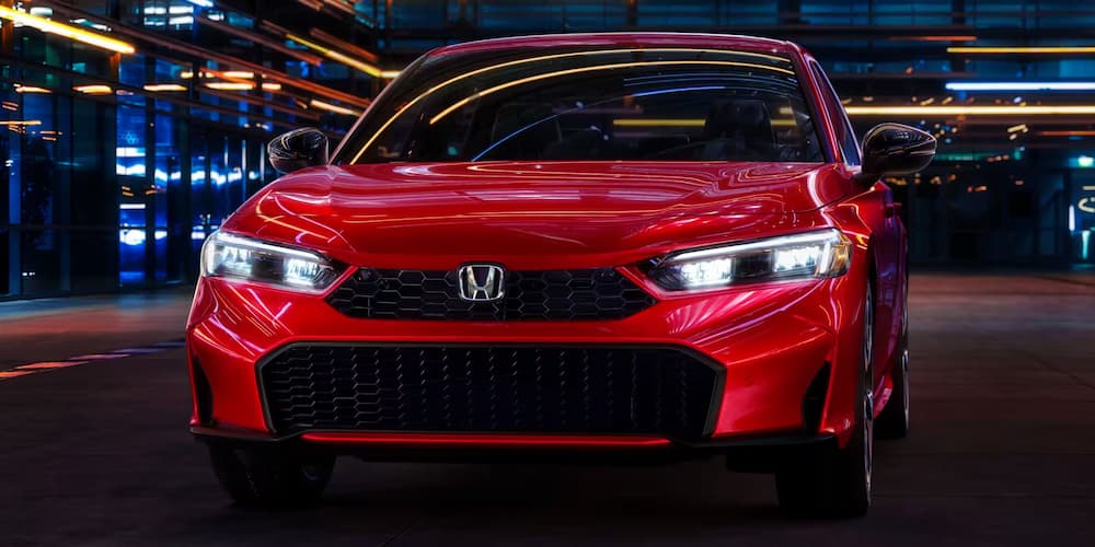 Red 2026 Honda Civic parked head on