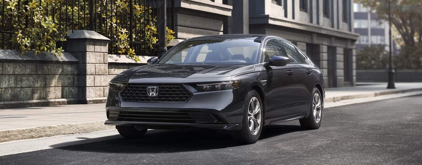 Grey 2026 Honda Accord parked on the side of a city street