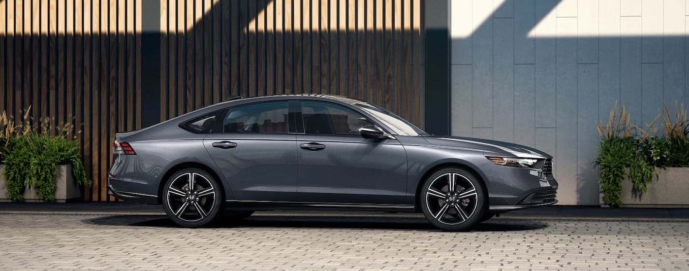A gray 2026 Honda Accord parked in a driveway