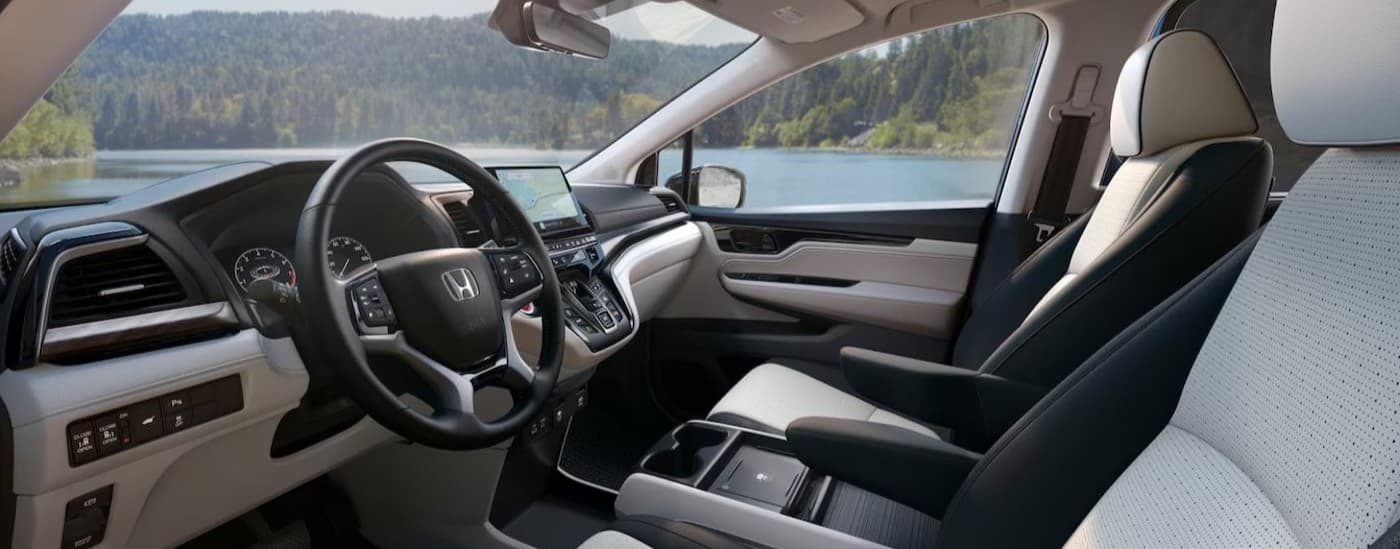 Black and gray interior and dash in a 2025 Honda Odyssey.